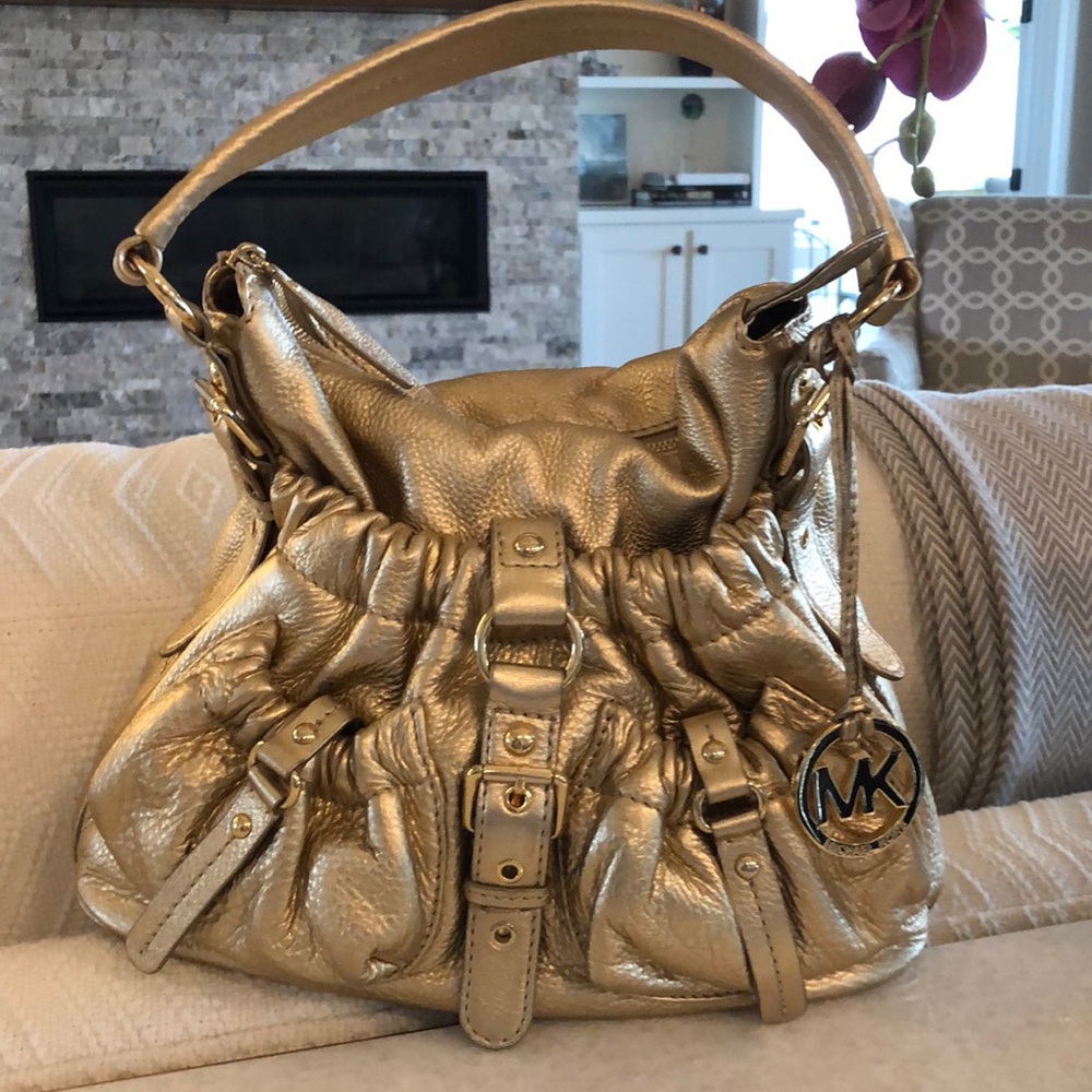 MK gold leather purse. Never used